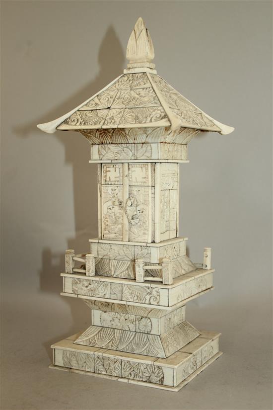 A Japanese ivory veneered model of a shrine, early 20th century, 32.5cm, wood stand